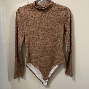 Cheetah long sleeve, high neck body suit